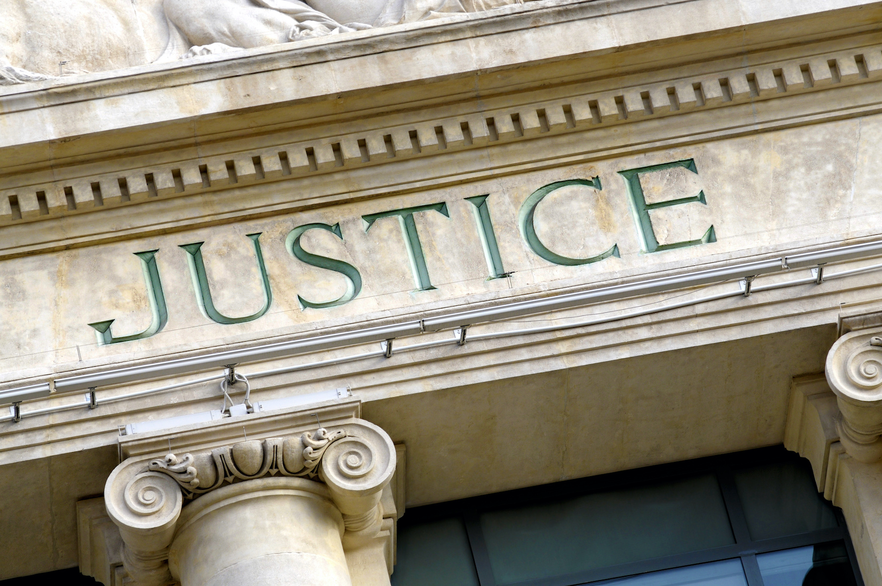 building column with the word Justice