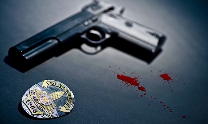 gun and police badge